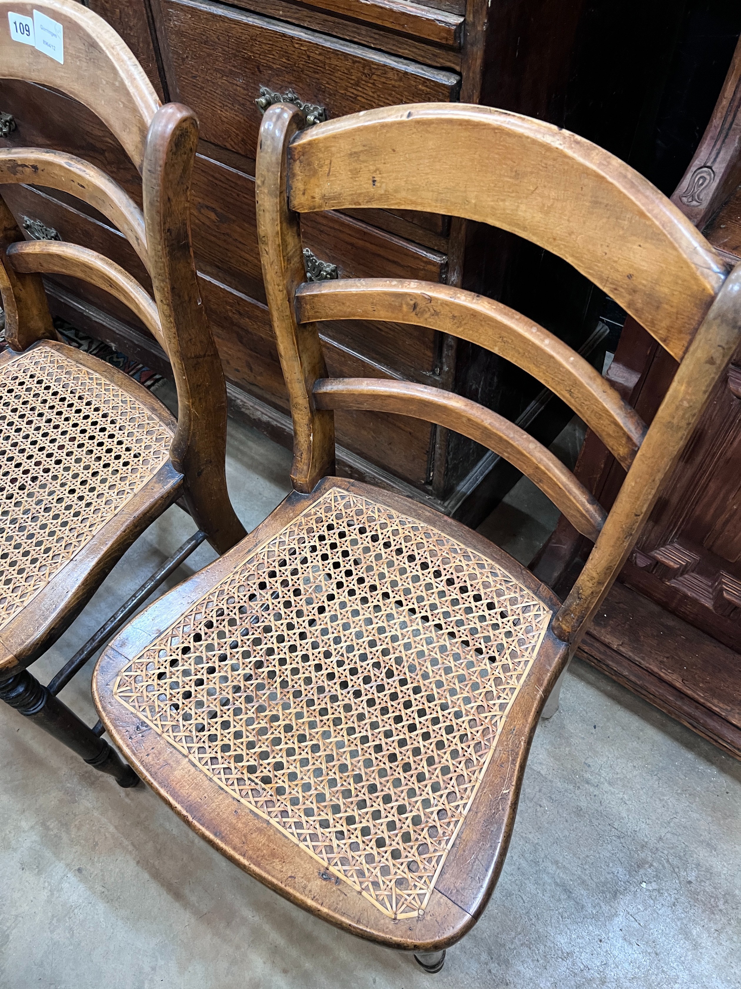 Three Victorian caned beech ladder back dining chairs *Please note the sale commences at 9am.